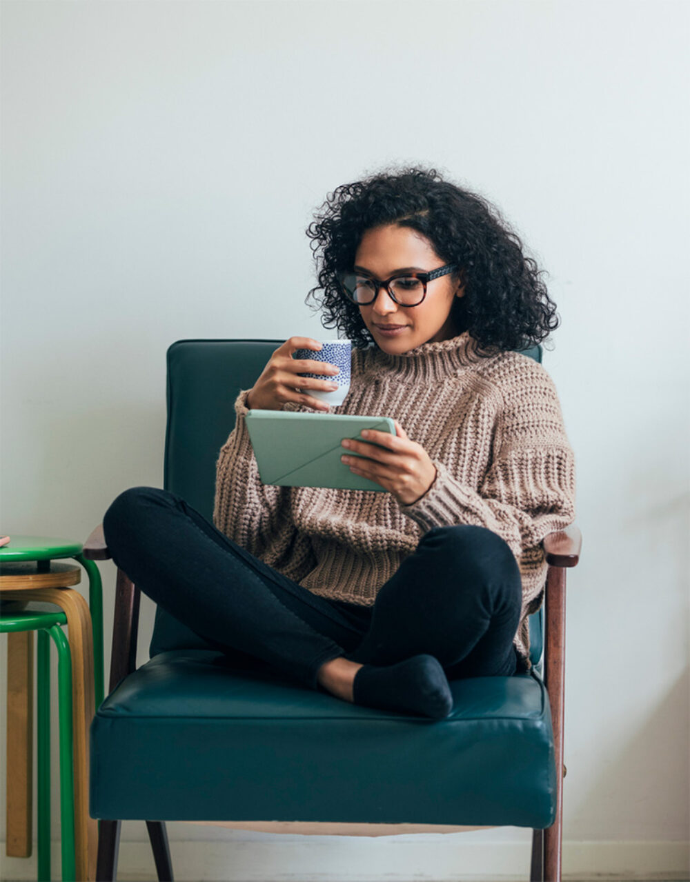 Woman reading from a tablet