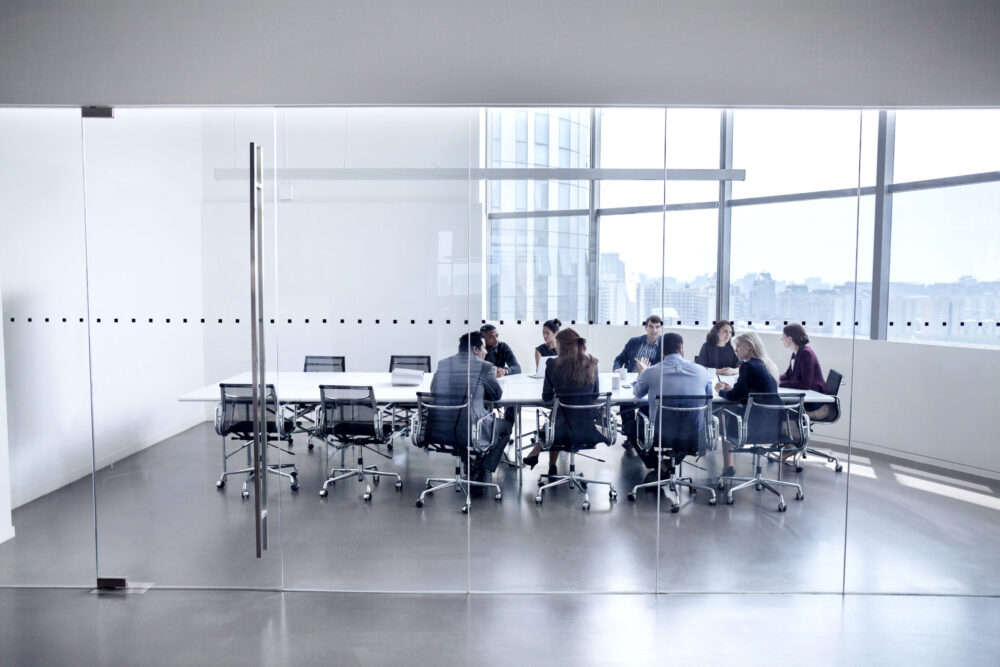 Colleagues At Business Meeting In Conference Room