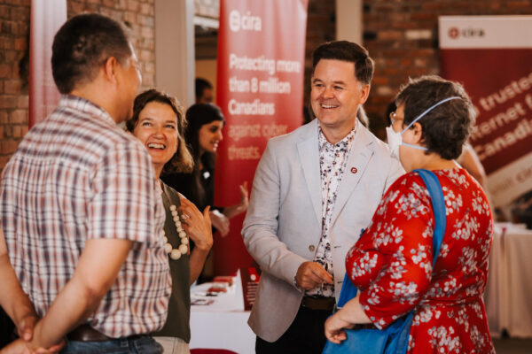 People laughing together at Canadians Connected: Edmonton