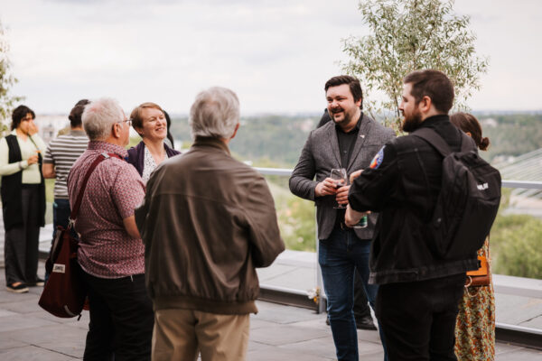 Chad ohman talking to attendees at Canadians Connected: Edmonton