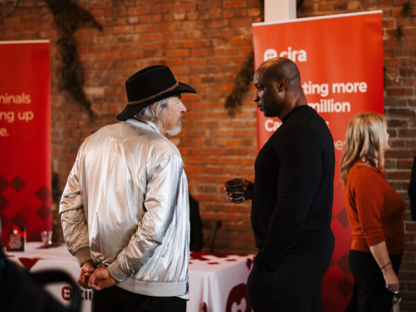 Two people talking at Canadians Connected: Edmonton