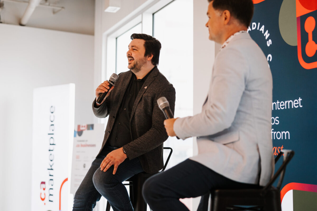 Chad Ohman and Spencer Callahan on stage at Canadians Connected: Edmonton