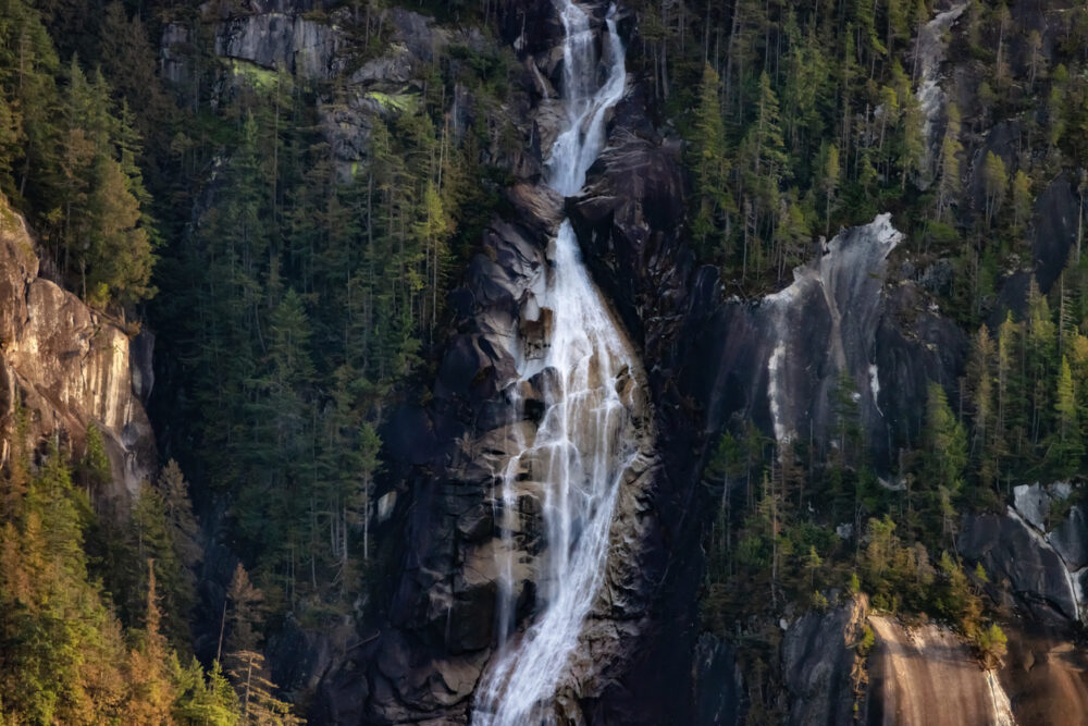 Shannon falls hike in squamish, bc, canada. canadian nature background.
