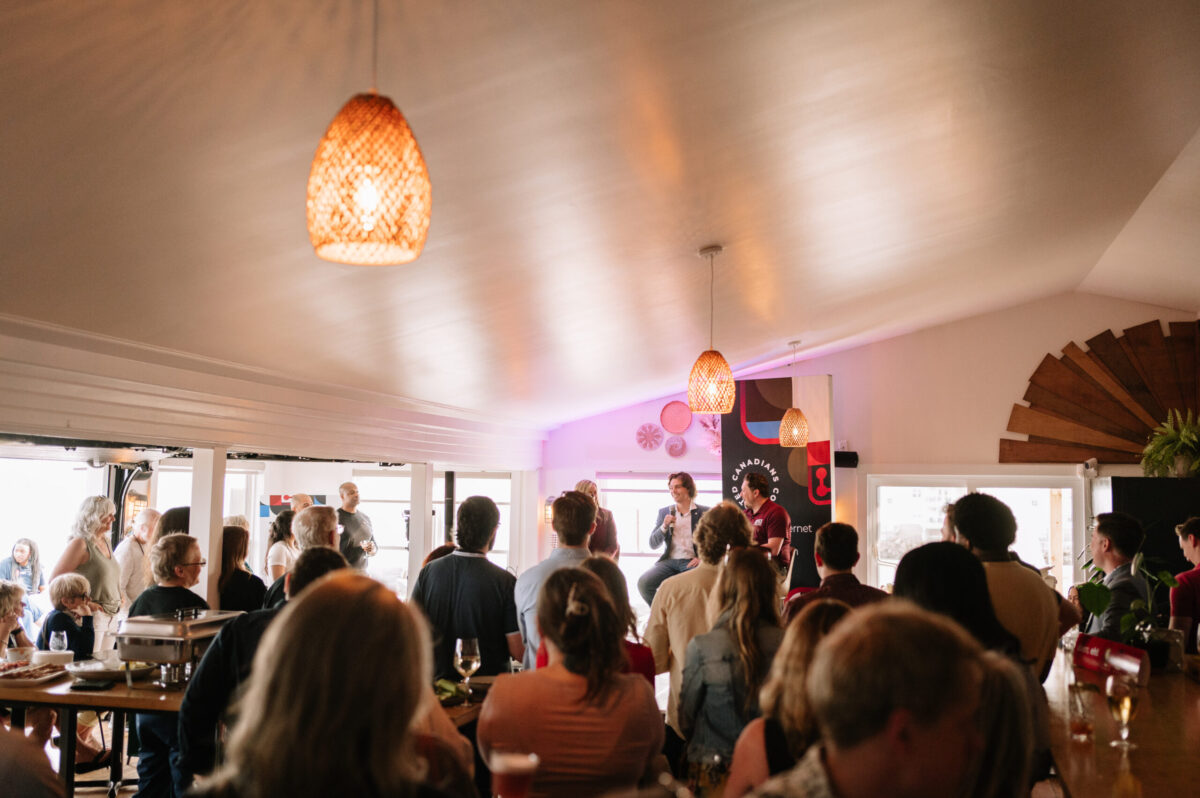 Amber Mac, Coltin Handrahan and Jeremy Heartz speaking to a full room art Canadians Connected: Charlottetown