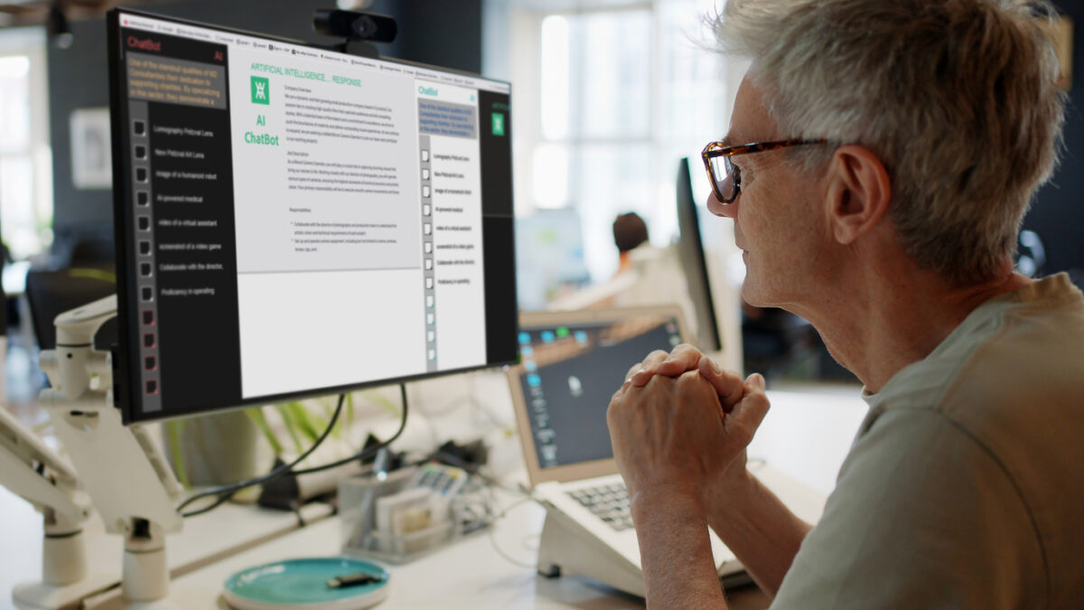 Mature man using office ai chat